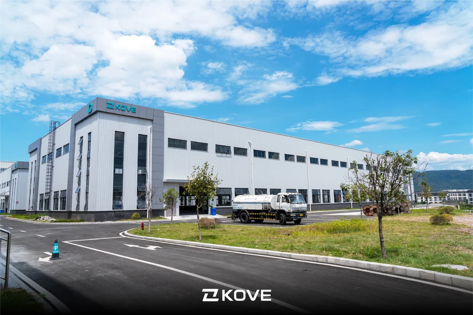 KOVE industrial building, with the brand's logo on the facade.